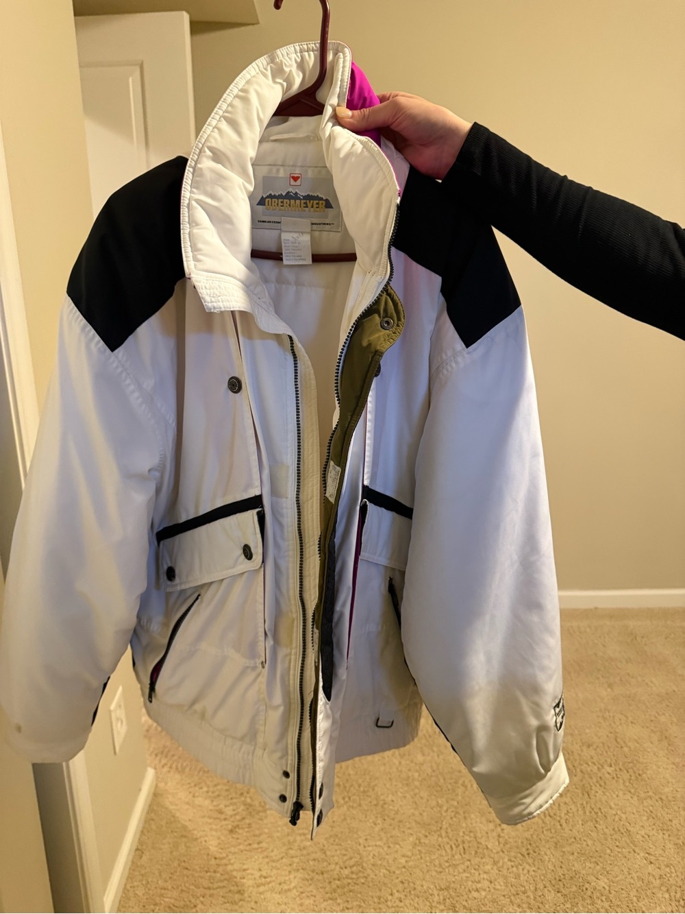 Obermeyer White Jacket with Gold Logo and Blue Accent
